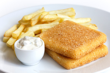 Plate of golden fried cheese, chips, tartar sauce.
