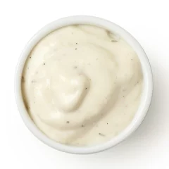 Gardinen Small pot of garlic mayonnaise, isolated, detail, from above. © Moving Moment