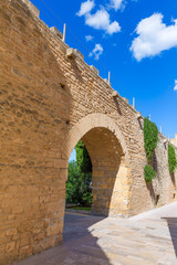 Fototapeta na wymiar Alcudia Old Town fortres wall in Majorca Mallorca