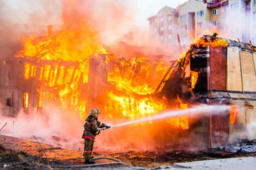 Fireman extinguishes a fire