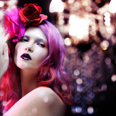 beautiful girl with pink hair, amid a festive flare