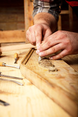 Carpenter restoring old furniture