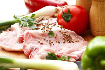 the preparation of meat and vegetables for a meal