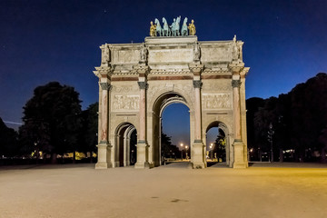 Triumphal Arch (Arc de Triomphe du Carrousel) at night. Paris.
