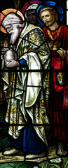 Fototapeta na wymiar The three kings visiting Jesus in stained glass