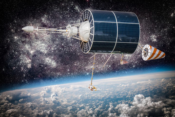 Obraz premium Kosmiczny satelita nad planetą Ziemią