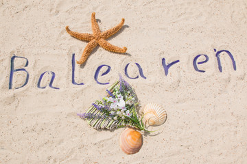 Sandschrift Balearen und seestern 