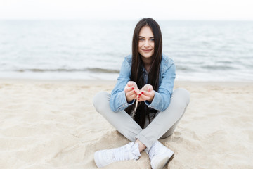 Young girl on the Baltic sea beach