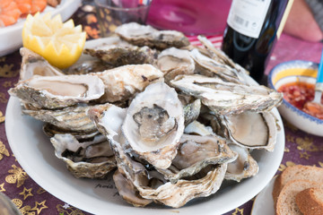 Fresh Oyster with Lemon  on plate