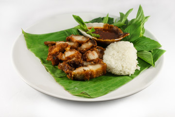 fried pork and sticky rice with sauce