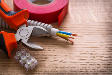 nippers insulating tape and terminal blocks for electric cables 