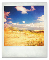 Instant photo of dunes and sky