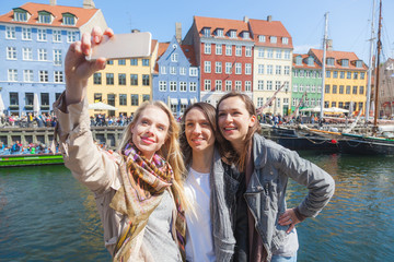 Fototapeta na wymiar Group of women taking a selfie in Copenhagen