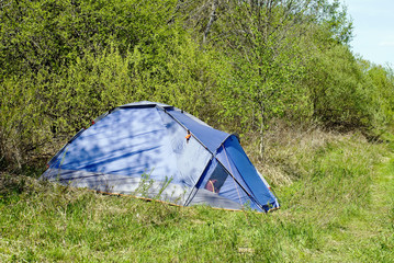 Tourist tent stands on the edge
