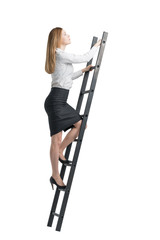 blonde young woman is climbing up © ImageFlow