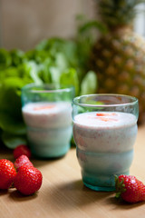 2 glasses with banana-strawberry smoothies 