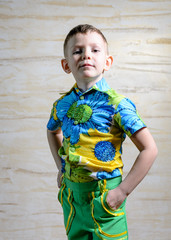 Boy Wearing Floral Print Shirt with Hands on Hips