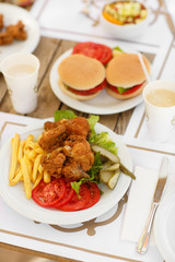 fast food hamburger and chicken fried potato
