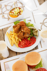 fast food hamburger and chicken fried potato