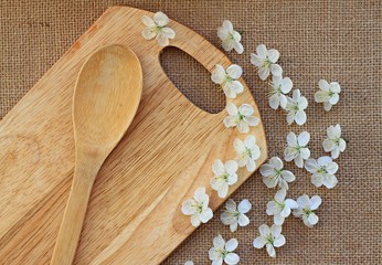 wooden kitchen utensils canvas flowers culinary background