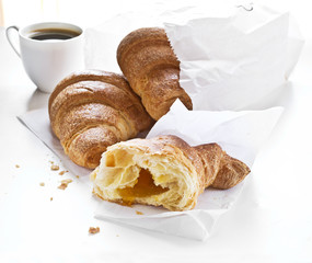 Fresh croissants on white background.