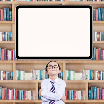 Smart Little Student Looking Up At Whiteboard