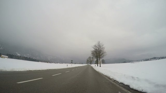 Driving with a on-board-camera in a winter landscape