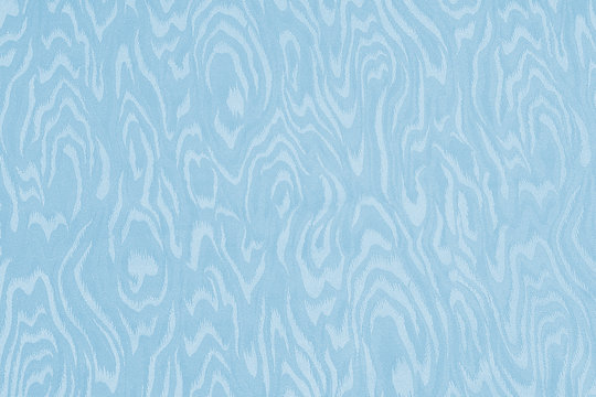 Light blue silk damask fabric with moire pattern