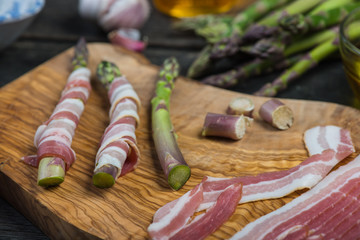Italian dish, fresh asparagus wrapped in pancetta and grilled