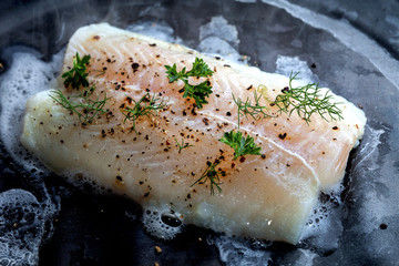 Pangasius fillet with spices and vegetables