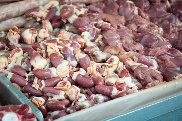 Raw Chicken Hearts in the Market
