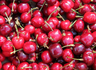 A Background of Fresh Red Fruit Cherries.
