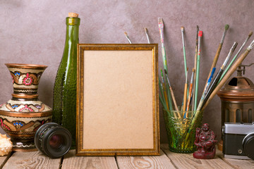Mock up poster frame with vintage artistic objects