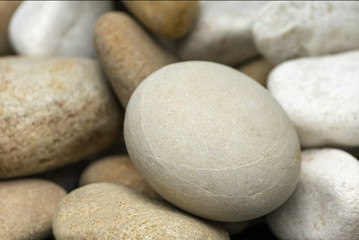 Fototapeta na wymiar Closeup zen stone on background of the stones.