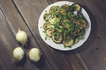 fried zucchini with onion