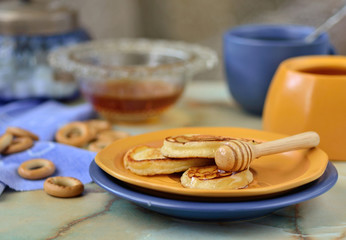 Pancakes with honey.