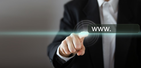 Businessman's hand pressing the icon with text 