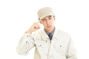 苦悩する作業員