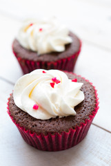 Red velvet cupcake closeup. Filtered to look like an aged instan