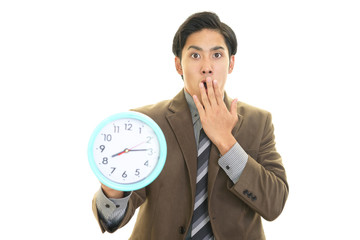 驚いた表情のビジネスマン