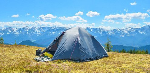 Tourist tent in mountains