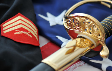 Symbols of a Marine. Sabre, flag, uniform.