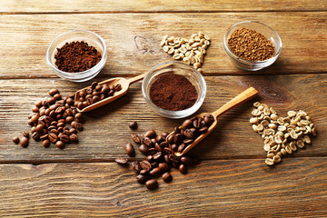 Various of coffee in small dishes on wooden table, top view