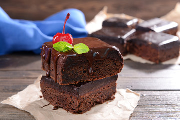 Delicious chocolate cakes on table close-up
