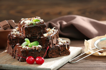 Delicious chocolate cakes on table close-up