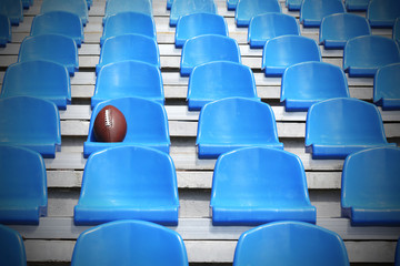 Rugby ball on stadium seat