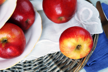 Tasty ripe apples on table close up