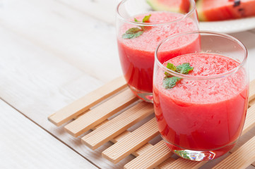 Fresh watermelon juice in the glass.Selective focus on the front
