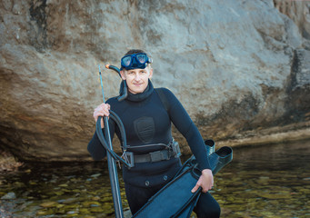 man in a suit underwater hunter