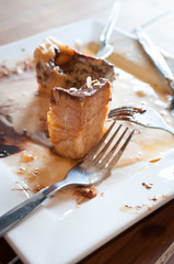 An empty plate, dirty after the meal is finished.